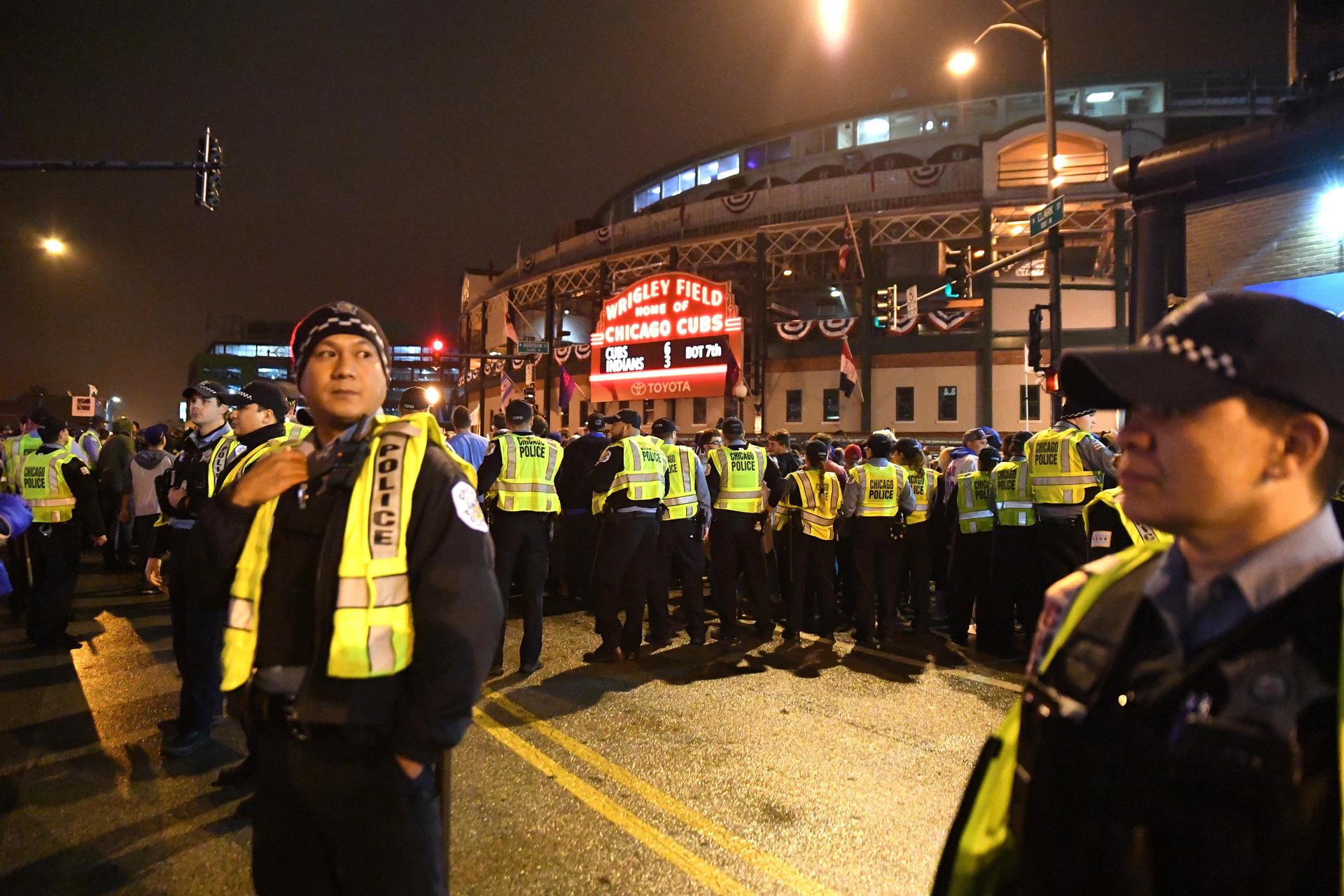 A group of Chicago police officers stand guard outside Wrigley Stadium during the World Series in 2016.