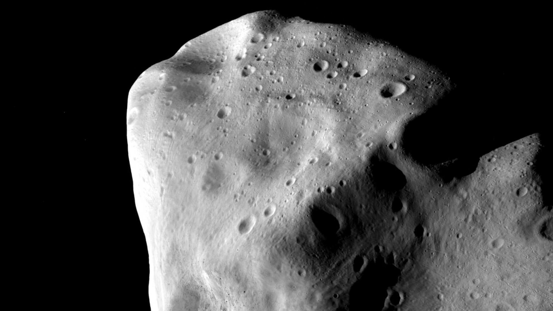 A picture shot by ESA's Rosetta mission's OSIRIS instrument shows asteroid Lutetia at a distance of 3162 km (1964 miles) its closest approach, July 10, 2010. The images show that Lutetia is heavily cratered, having suffered many impacts during its 4.5 bil