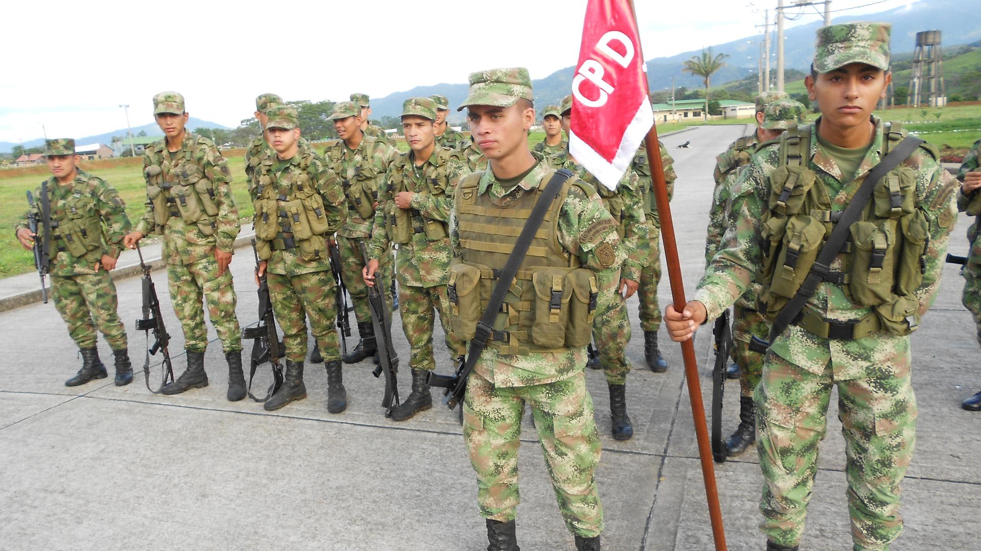 Young Colombian army troops in the southern town of Uribe, which used to be a FARC stronghold. Some are draftees serving their obligatory 18 months service; others are professional soldiers. Most come from humble backgrounds.