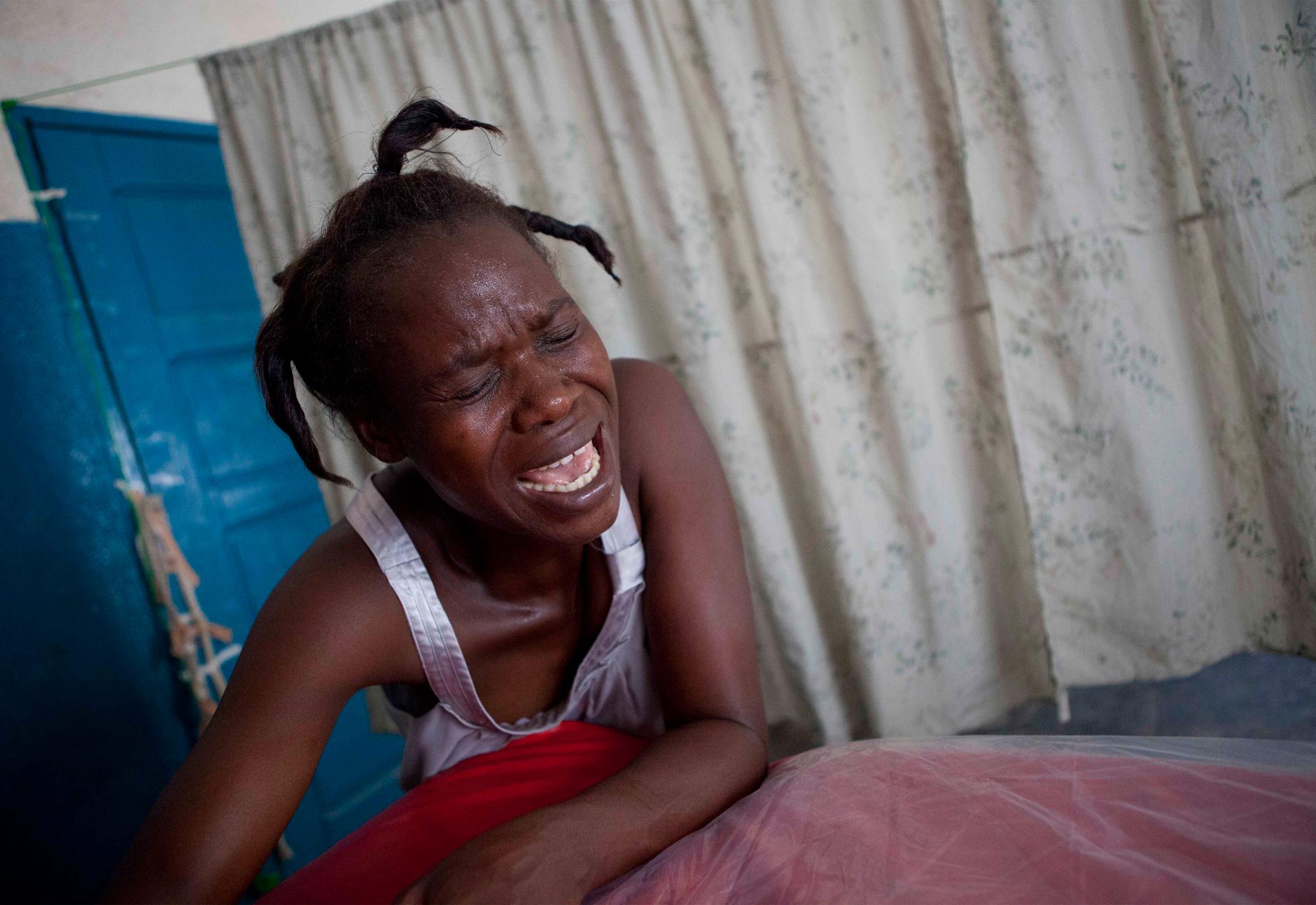 44-year-old Elali Bao labors with her sixth child at a maternity clinic in the Democratic Republic of Congo.