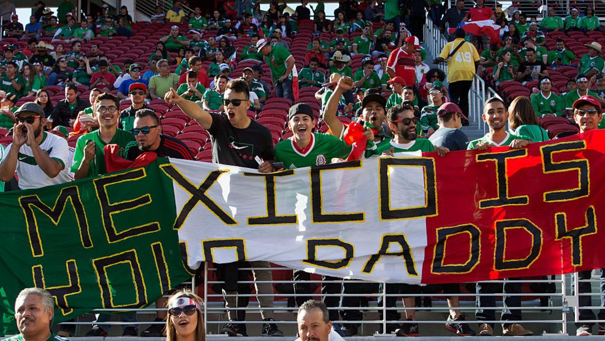Mexican fans cheer their team on before the Copa America match with Chile.