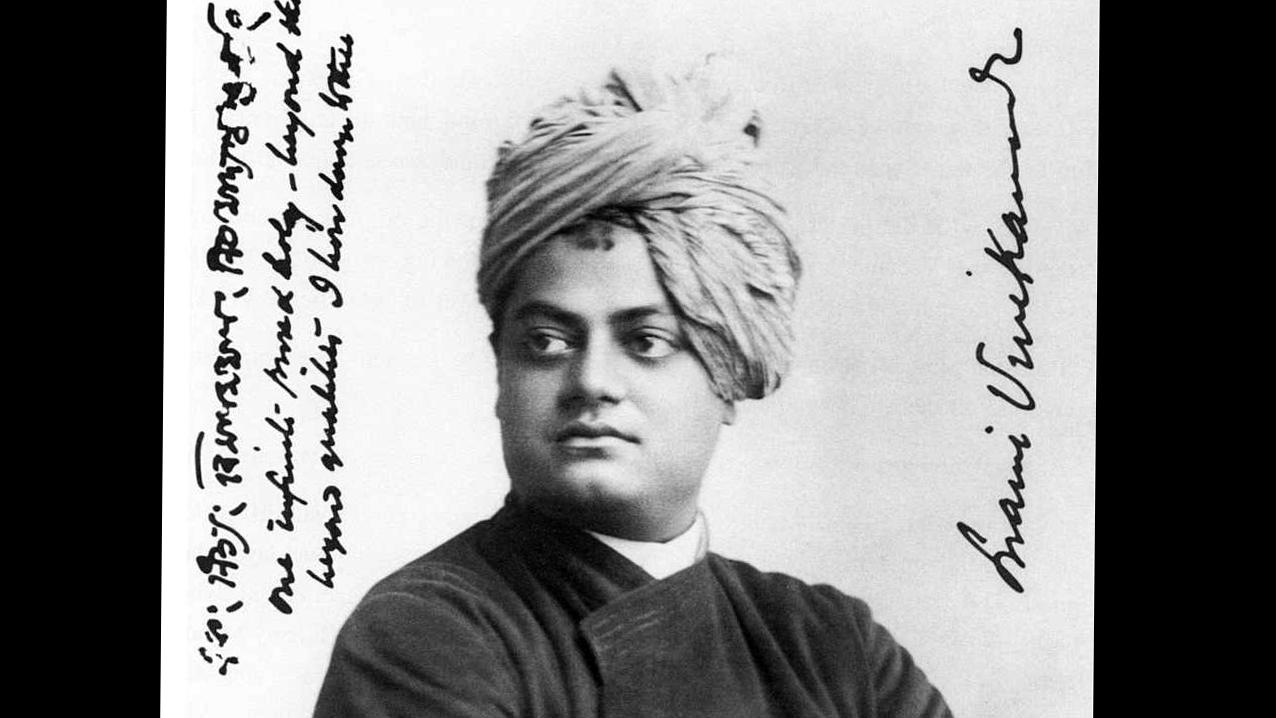 A photograph of  Swami Vivekananda in 1893 during his visit to Chicago. On the left, Vivekananda wrote: "One infinite, pure and holy – beyond thought, beyond qualities, I bow down to thee."