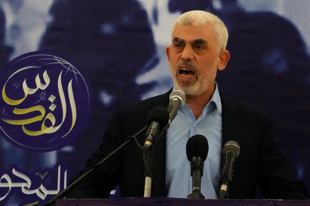 Yahya Sinwar, head of Hamas in Gaza, delivers a speech during a meeting with people at a hall on the sea side of Gaza City, Saturday, April 30, 2022.