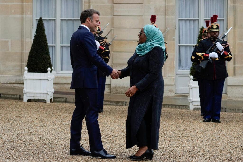 France's President Emmanuel Macron, left, welcomes Tanzania's President Samia Suluhu Hassan prior to a meeting as part of the "Summit on Clean Cooking in Africa" at the Elysee Presidential Palace, Tuesday, May 14, 2024, in Paris. 