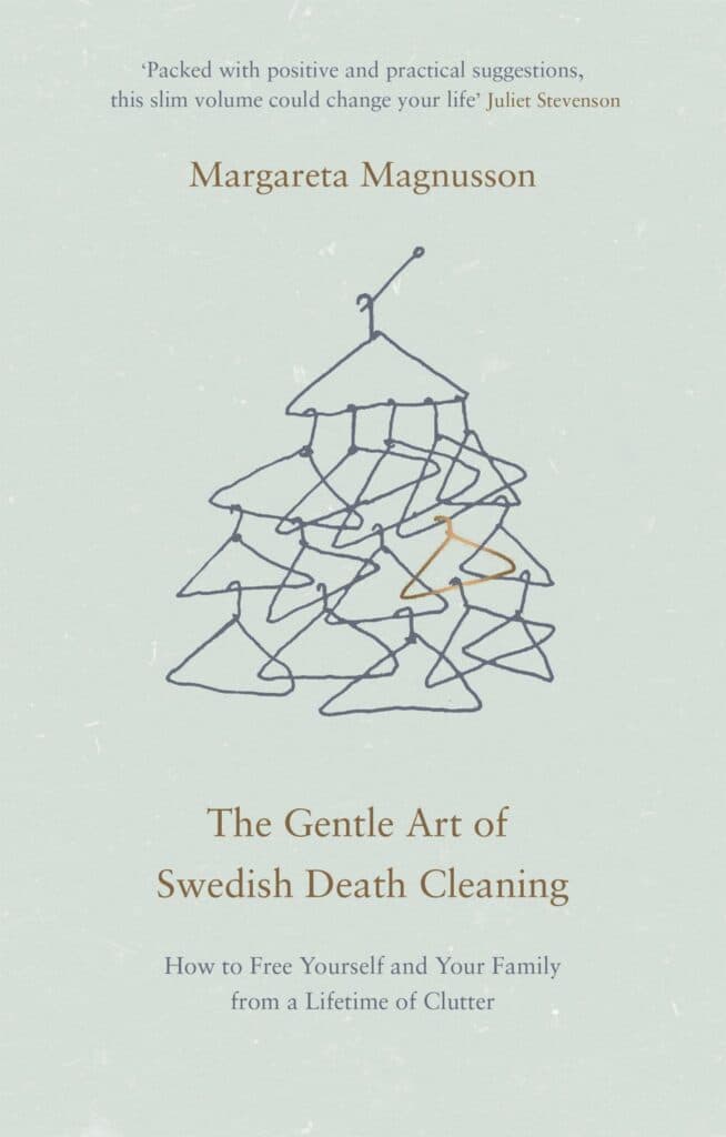 Cover of the book 'The Gentle Art of Swedish Death Cleaning' by Margareta Magnusson, featuring a simplistic line drawing of a stack of wire hangers and a quote by Juliet Stevenson at the top.