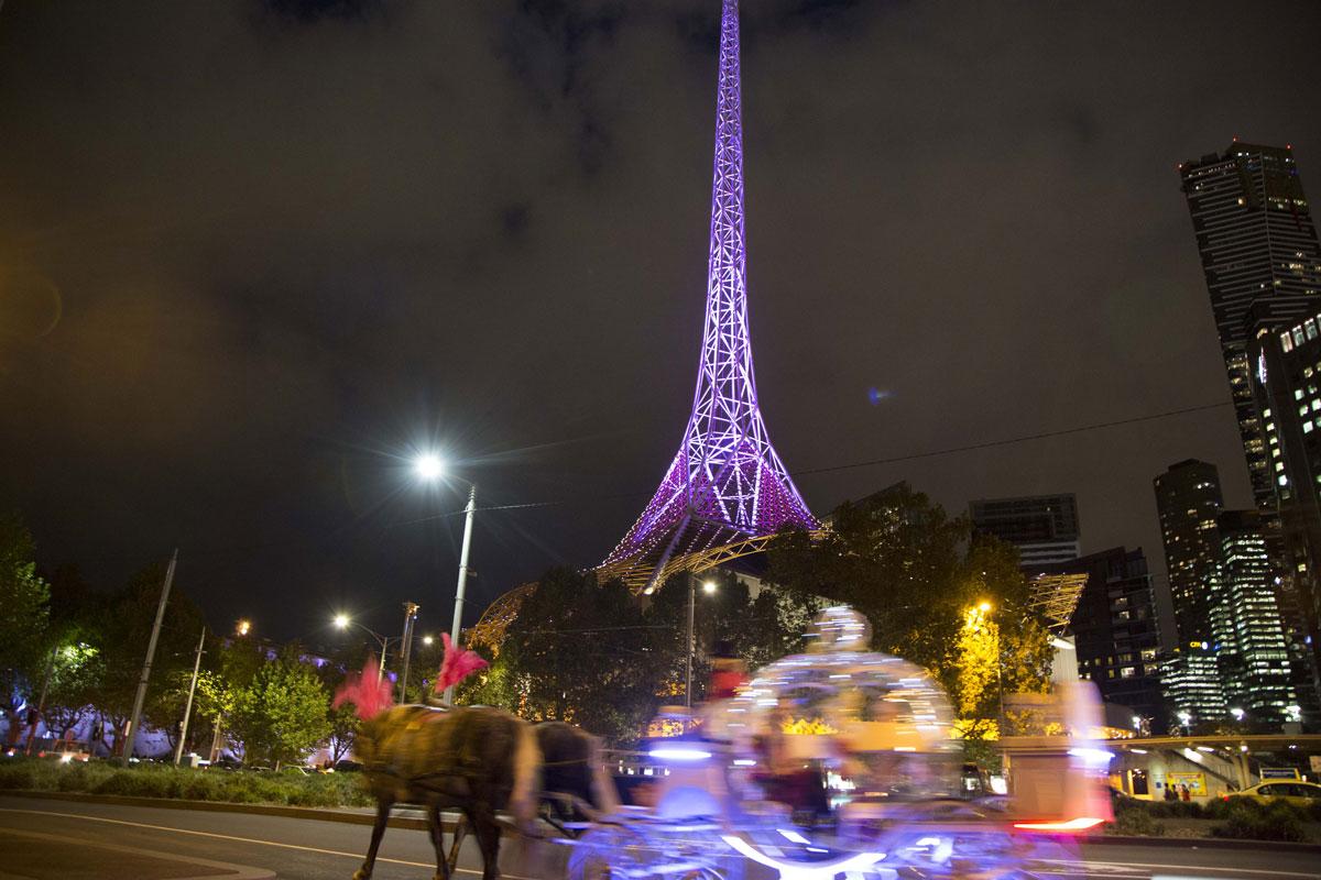 The Melbourne Arts center spire lights up purple in honor Prince.