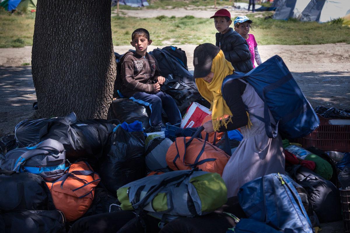 Refugees waiting to board a bus to Oraikastro Camp a few days before Idomeni Camp evacuation began.