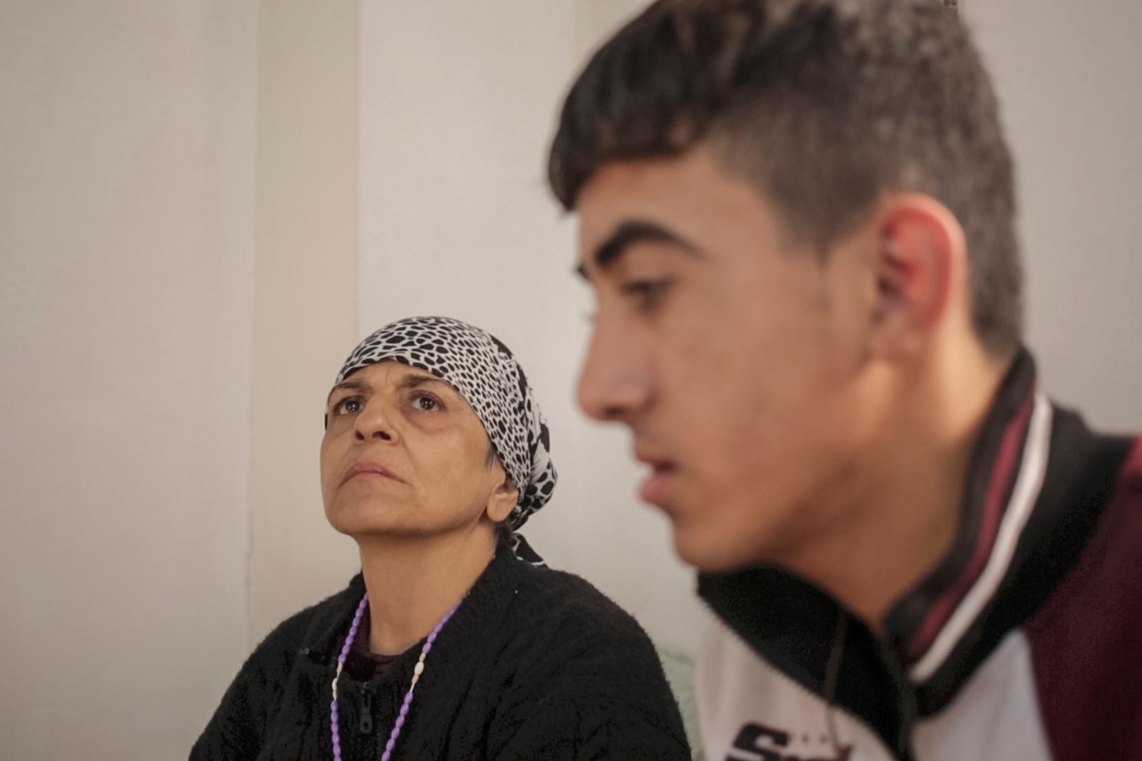 Jandar Nasi, a 54-year-old Christian Iraqi who fled ISIS-held Mosul with her son.