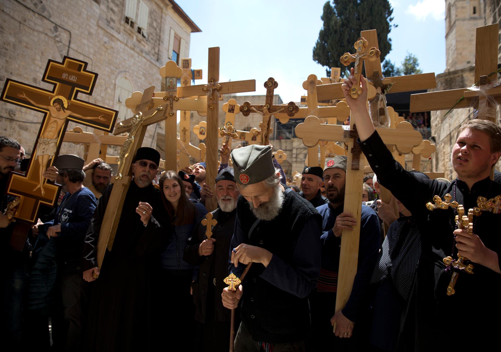 Christian pilgrims from Eritrea are seen amongst the thousands of pilgrims that came from all over the world and carried wooden crosses along Via Dolorosa, or “The Way of Sorrow.