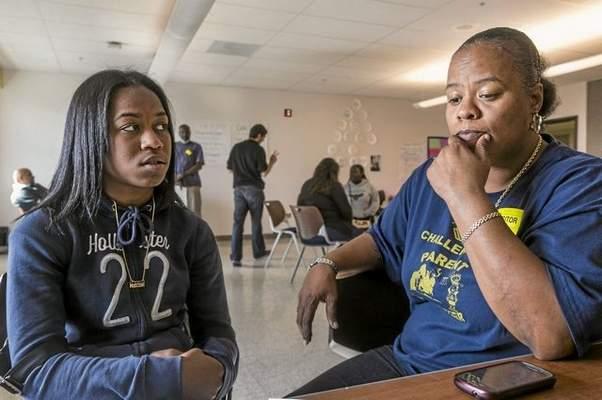 High school student Myriah Brisco, 14, left, and her mother, Ramona Roberson, comment on their restorative justice class at the Augustus F. Hawkins High School in Los Angeles.