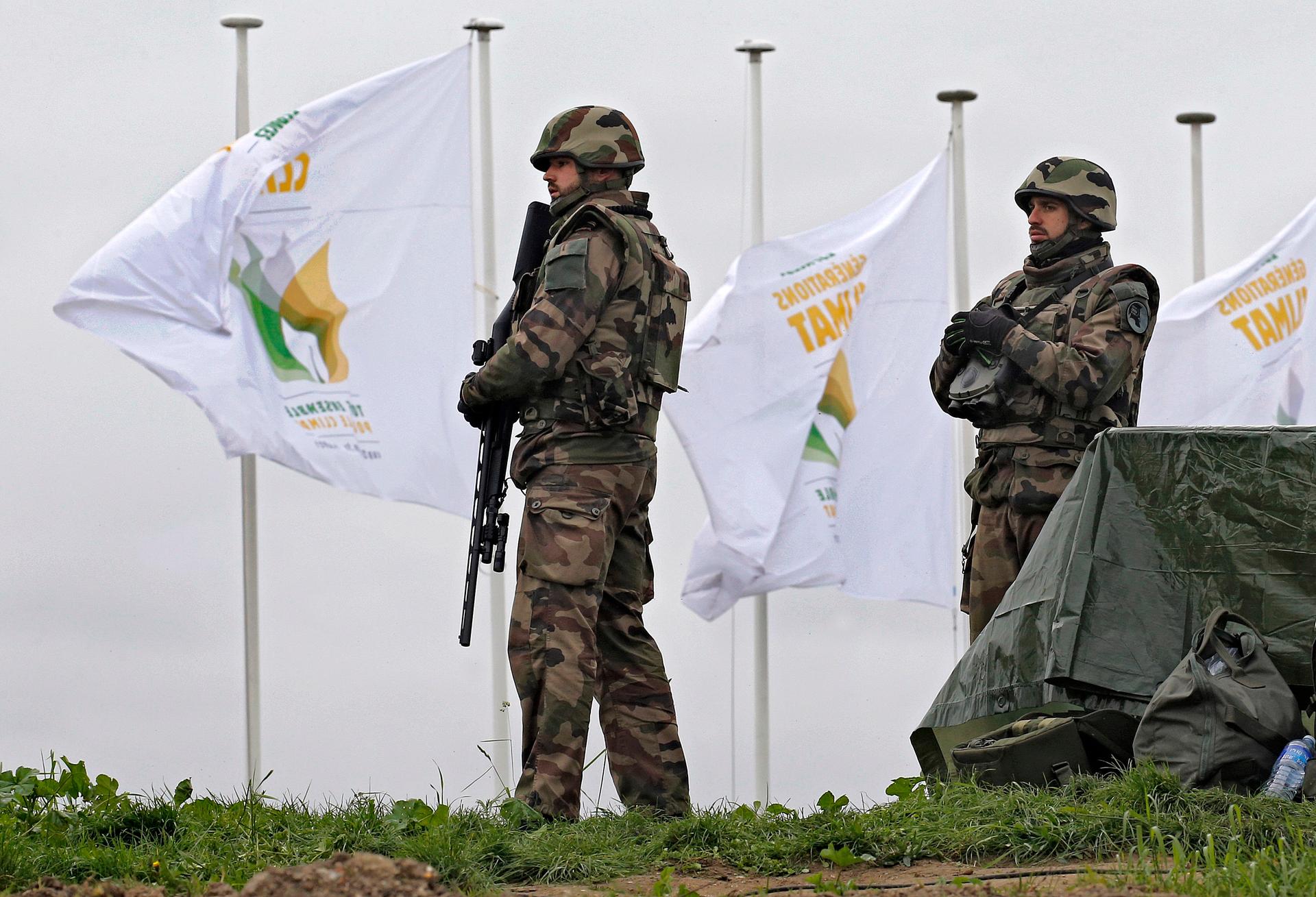 French soldiers stand on the site as tight security continues during the World Climate Change Conference 2015 (COP21).