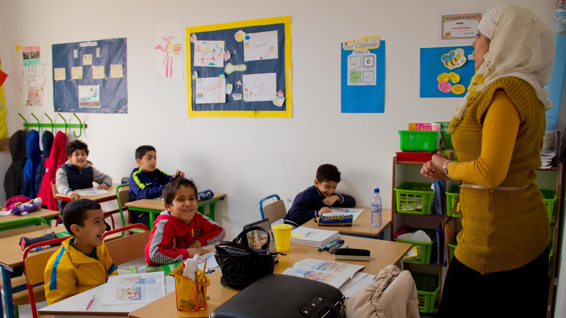 A lesson at TLC Academy in Tunis, where many classes are taught in English. Most of the students are Libyans.