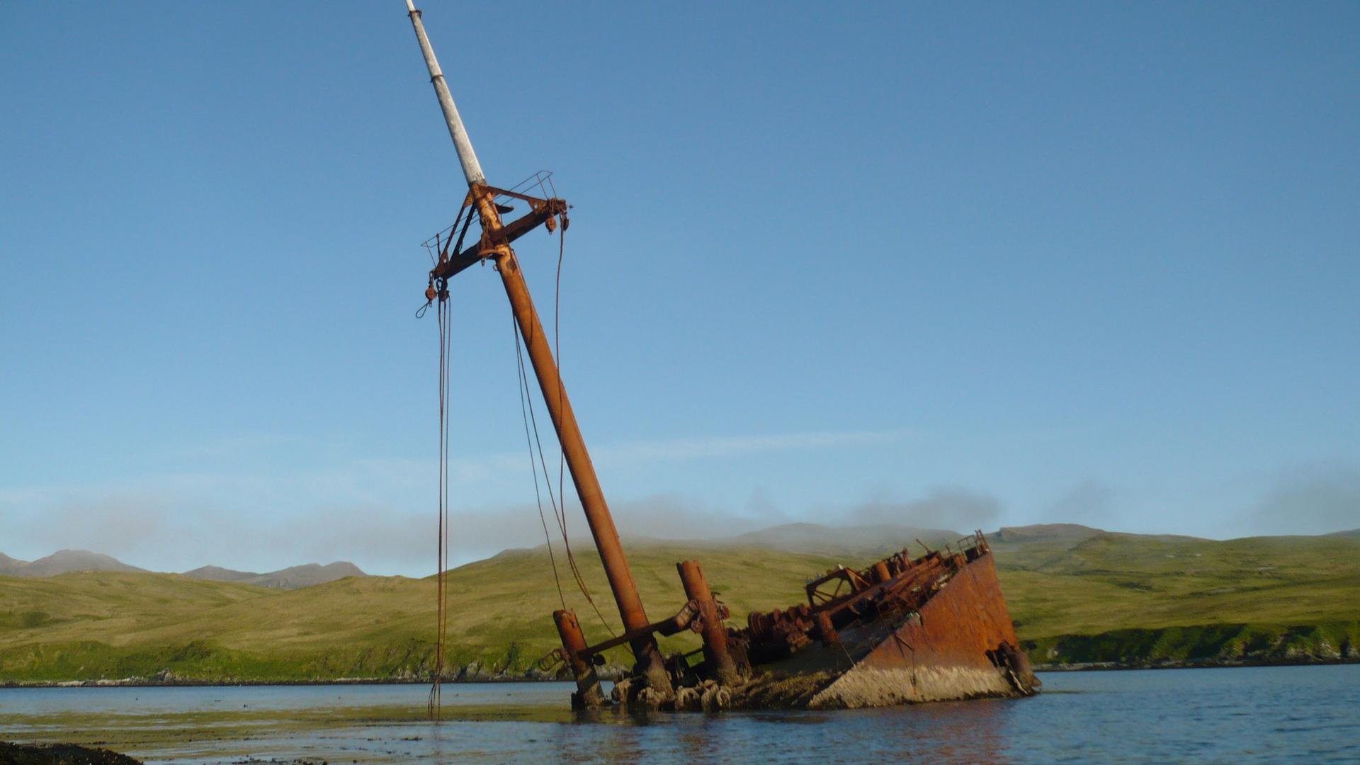 The rusted Japanese transport, Borneo Maru, decades after it was beached off the island of Kiska.