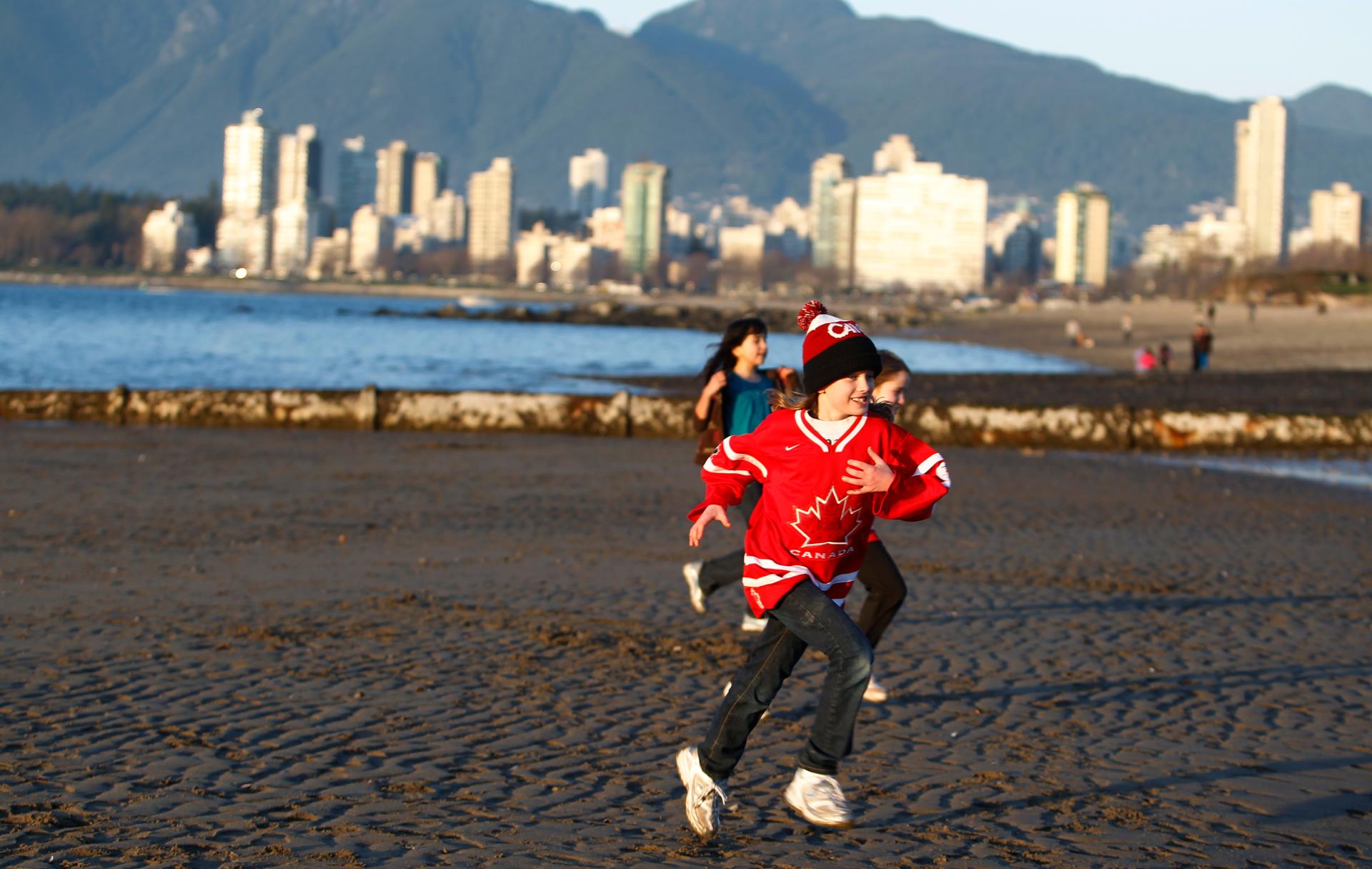 Children play on Vancouver's Kitsilano beach.