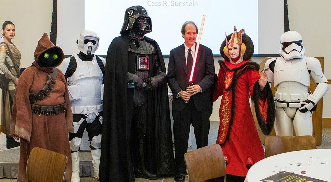 Cass Sunstein posing with Harvard students dressed as “Star Wars” characters after a lecture (Lorin Granger )