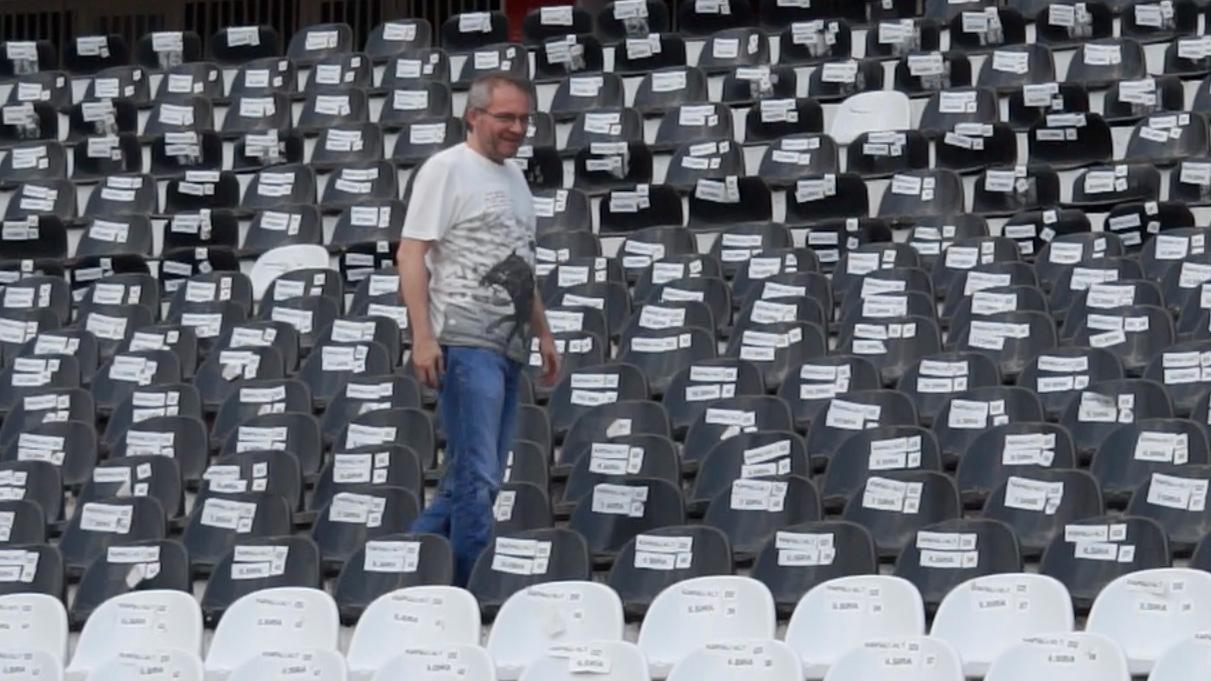 Cem Yakiskan walking in the stands of Besiktas' recently demolished stadium. He helped form the fan group Carsi back in 1982.