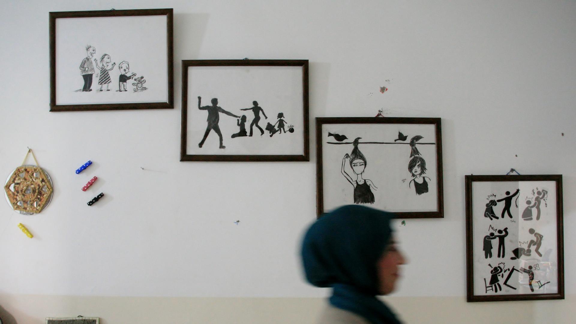 At the Institute for Family Health in Deir Alla, Jordan, there are domestic violence awareness posters. About half of the center's clients are victims of domestic abuse.