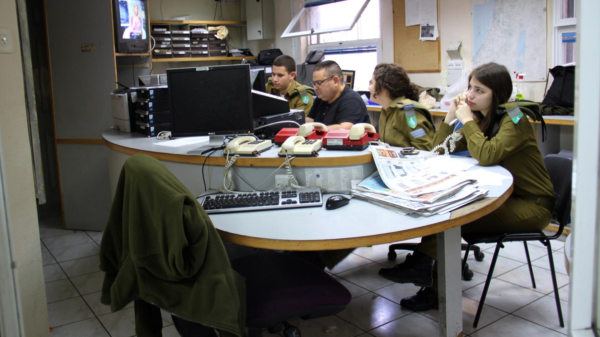 The offices may look like a college radio station, but this is Israeli Army Radio, the country's most popular purveyor of radio news and music.