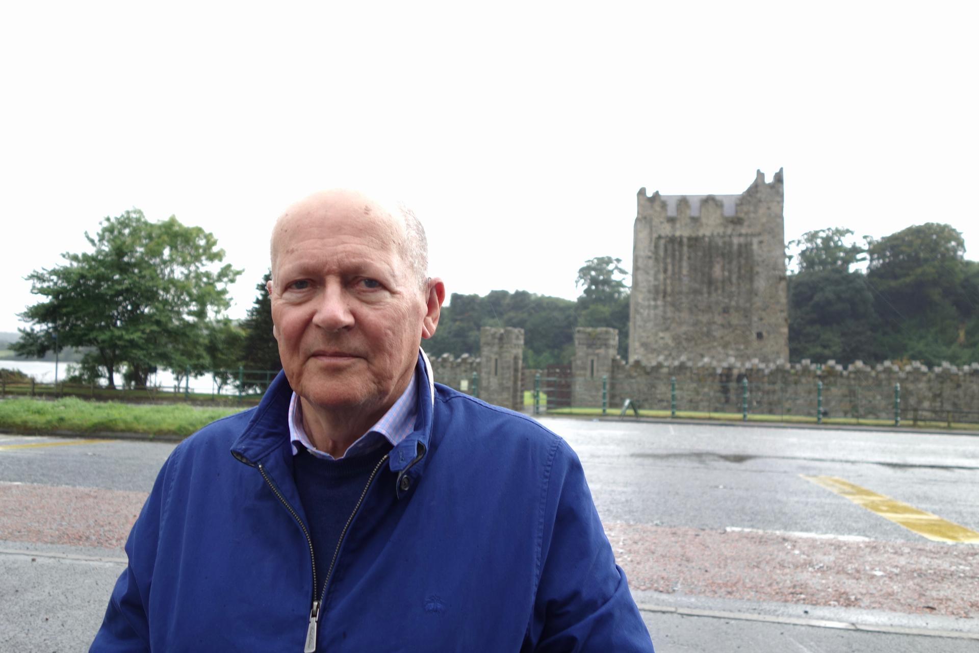 Irish journalist and author Conor O'Clery, standing at Narrow Water Castle, in Newry, County Down, Northern Ireland
