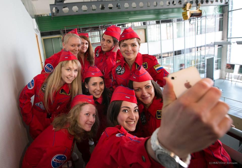 Russian cosmonauts pose for a selfie.