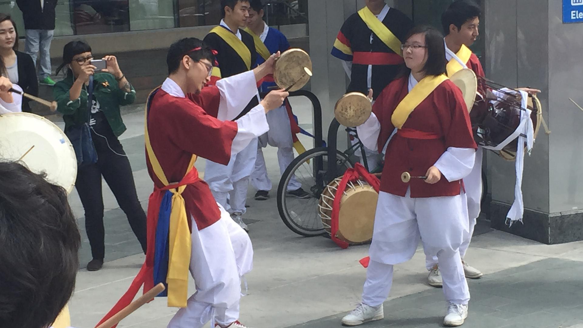 Korean drummers give a pop-up performance at the Western/Wishire Metro Station in LA's Koreatown.