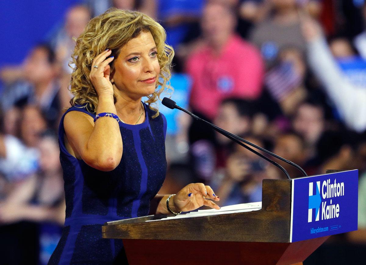 Then DNC Chairwoman Debbie Wasserman Schultz speaking at a rally, before the arrival of Hillary Clinton in Miami on Sunday. Schultz would later announce her resignation as head of the DNC.