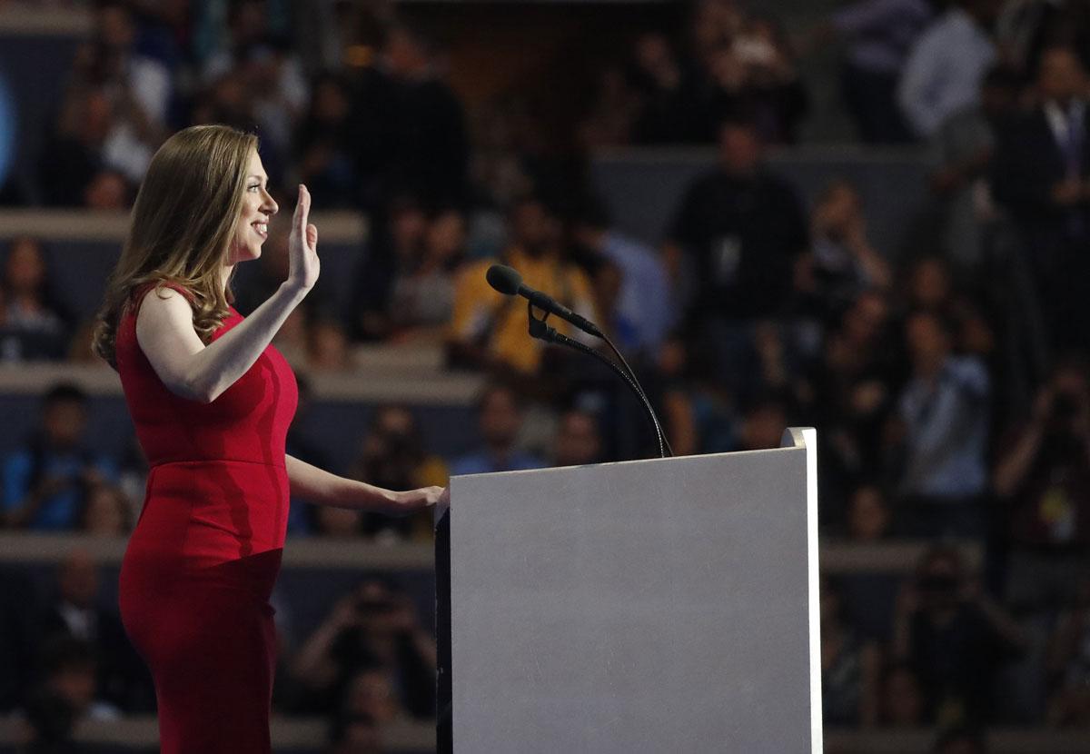 Chelsea Clinton waves as she introduces her mother at the DNC on Thursday night.