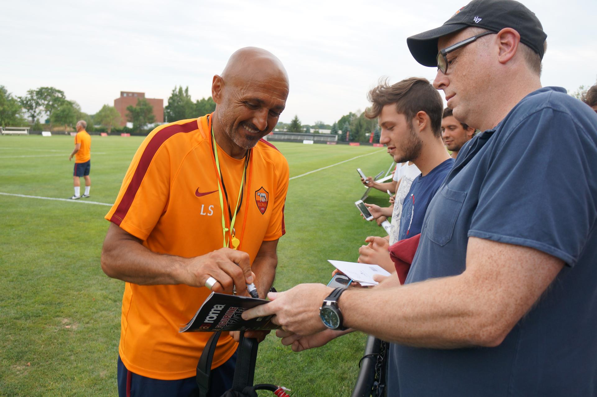 AS Roma’s coach Luciano Spalletti gives out signatures to fans. Some Russian fans called out ‘Zenit are Champions!’ to Spalletti who used to be the coach of the St. Petersburg team. Spalletti responded with a few Russian phrases which were greeted with