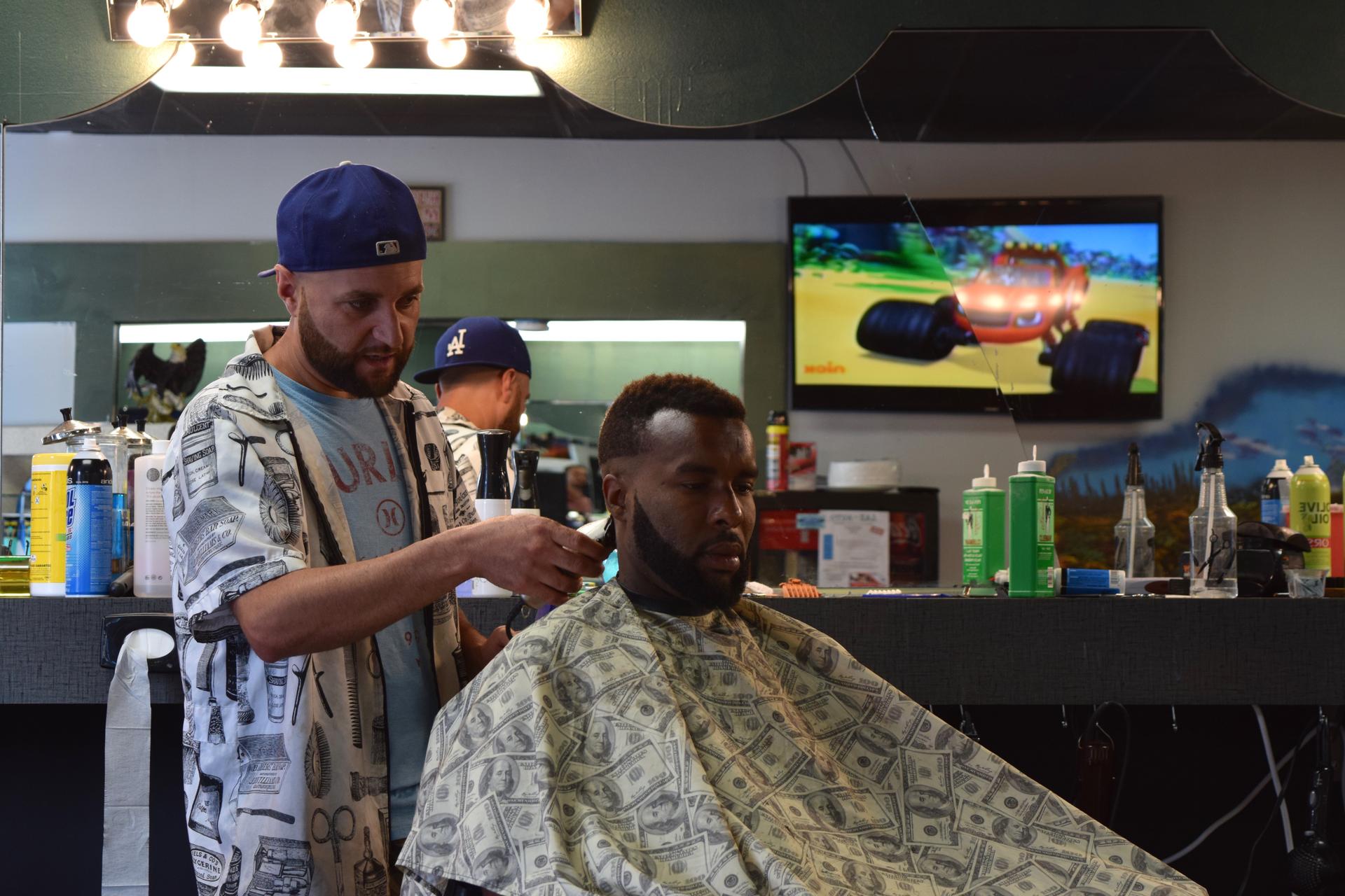 Hassan at his barbershop in Lincoln, Nebraska