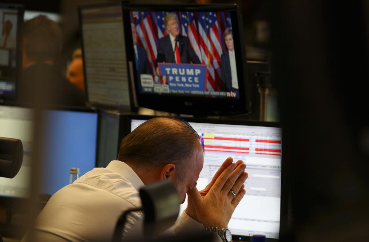 A trader at the stock exchange reacts to the US election in Frankfurt.
