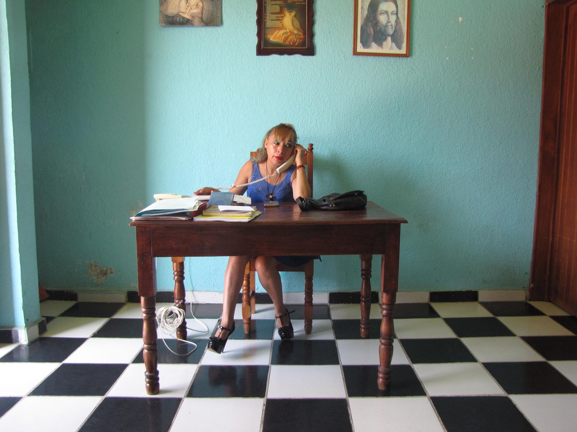 Attorney Elvira Gordillo Rivera sitting behind her desk in her office in downtown Frontera Comalapa, Chiapas, Mexico.