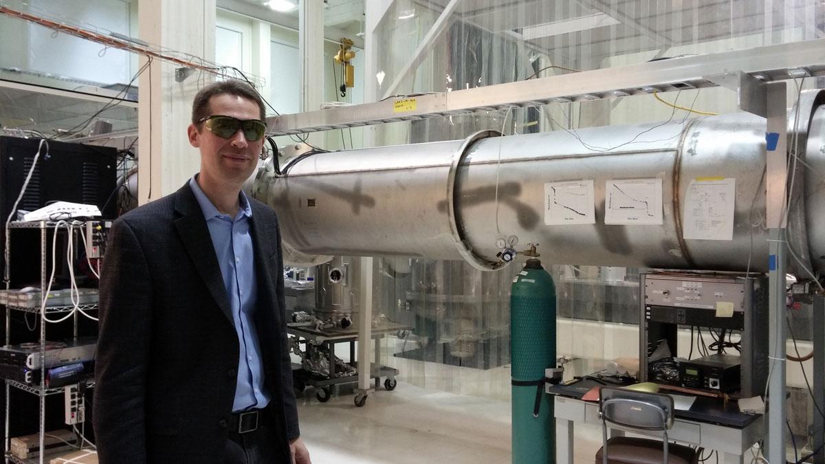 Physicist Matthew Evans at his lab at MIT in Cambridge, Massashusetts.
