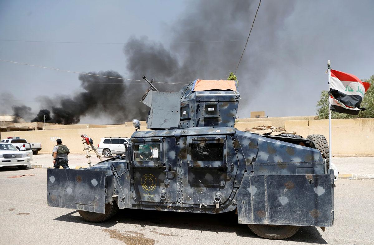 A military vehicle of Iraqi security forces is seen in Fallujah.