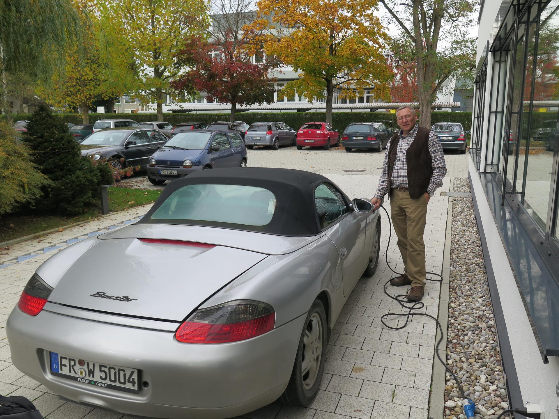 An old-school garage tinkerer, Wolfram Walter also converted his bicycle and this Porsche to run on electricity, often provided by the solar panels on his roof.