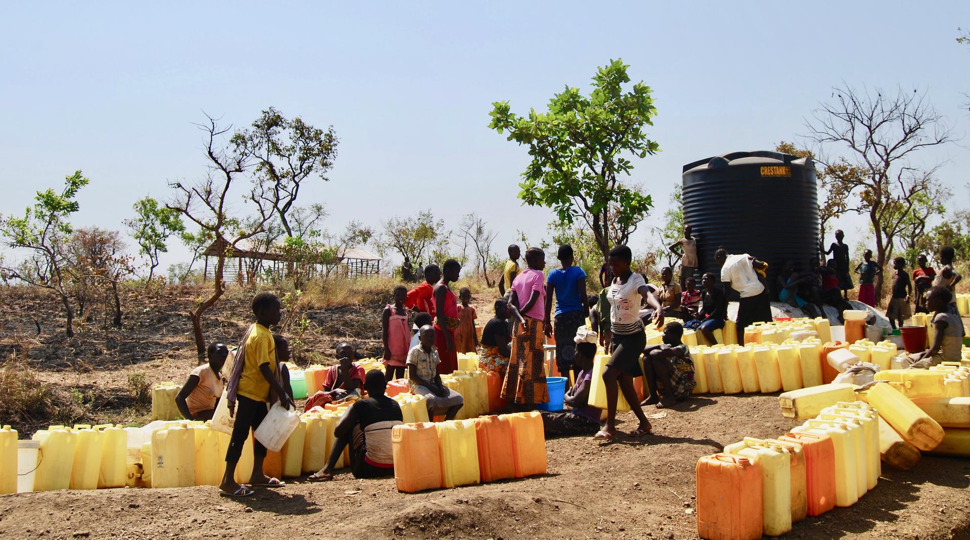 Refugees from South Sudan wait for water at the Bidi bidi refugee settlement in northern Uganda.