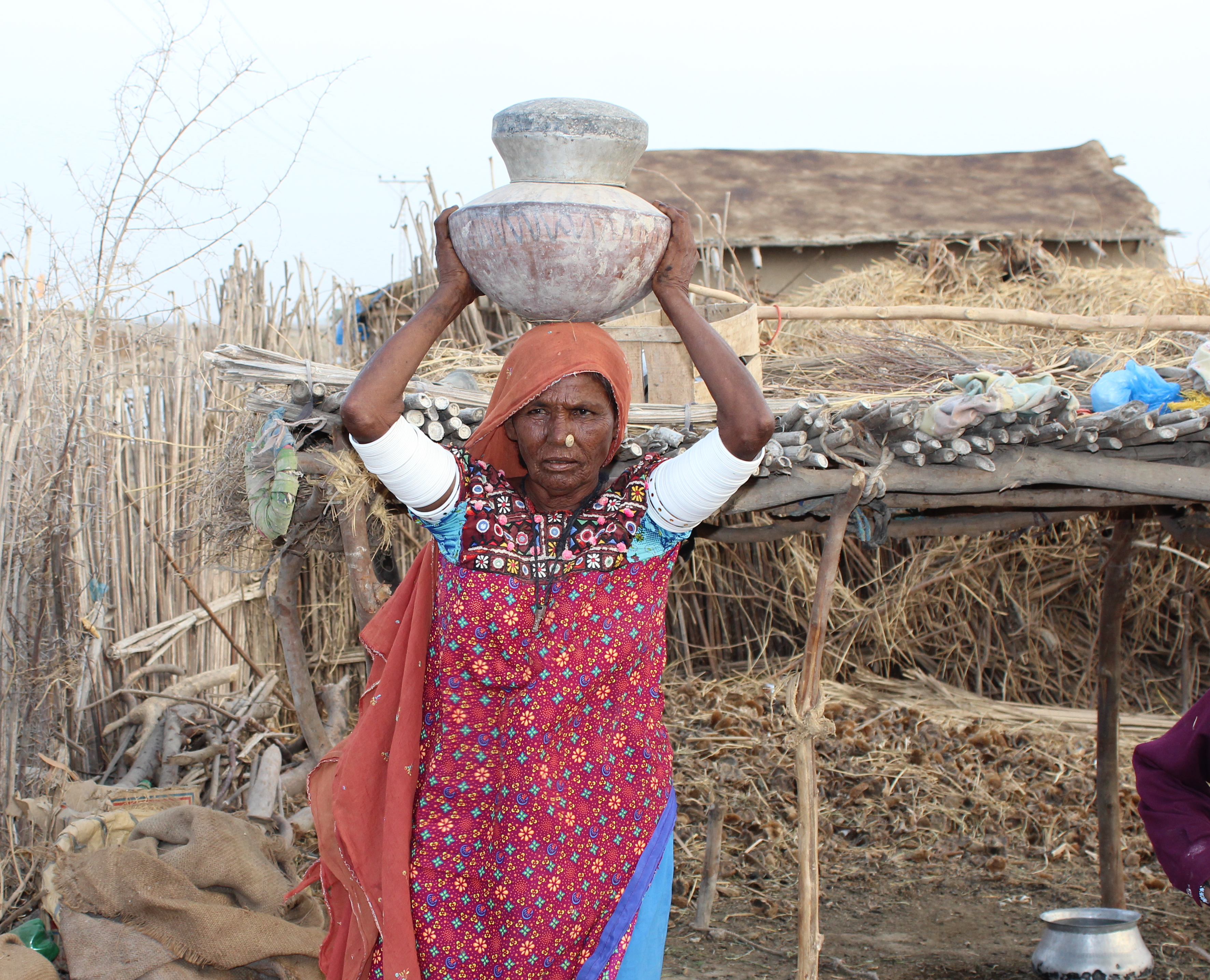 Woman in Pakistan retrieves water