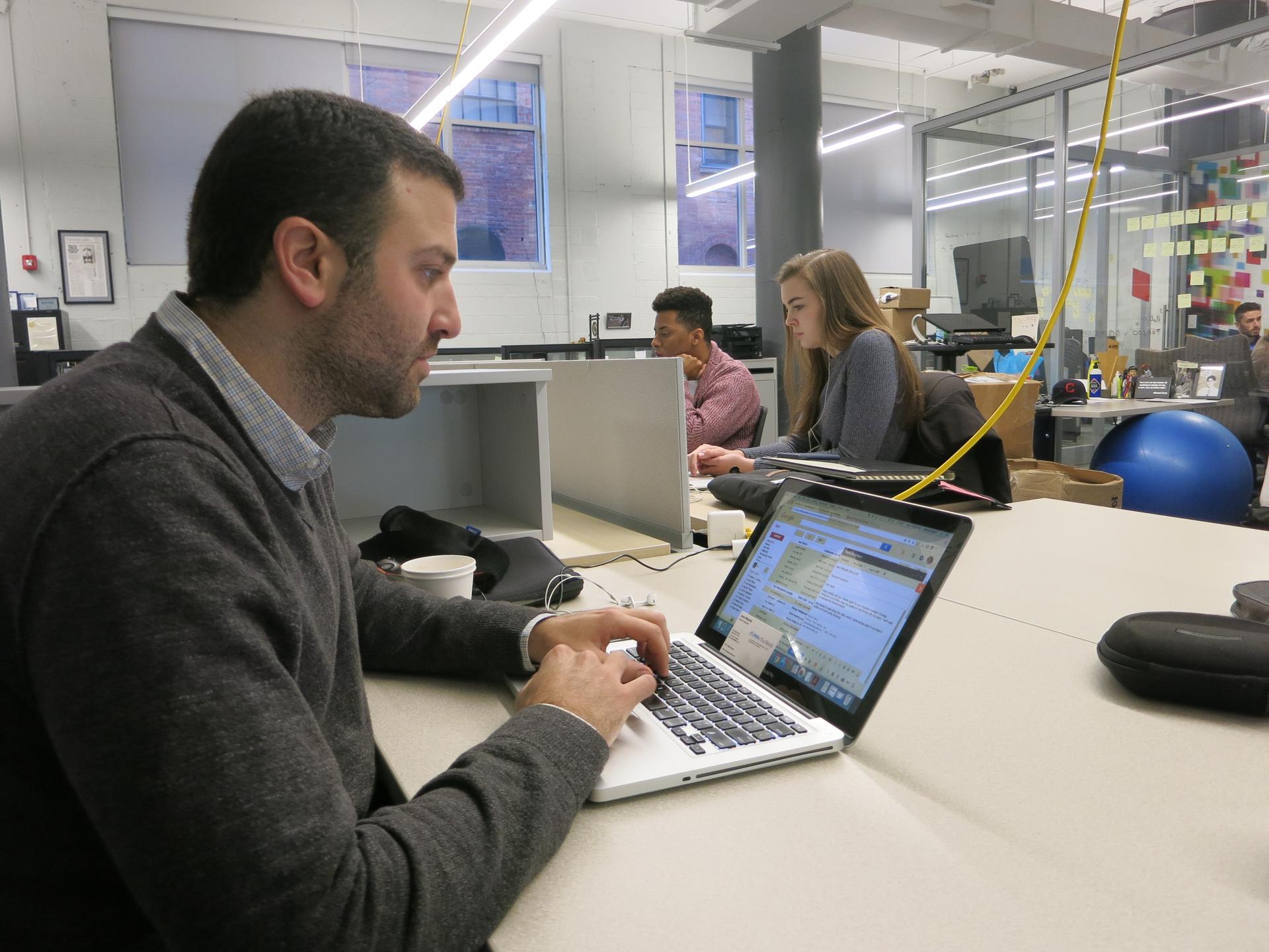 Daniel Shani, left, works out of 43North, a business incubator near downtown Buffalo that houses about 50-60 people.