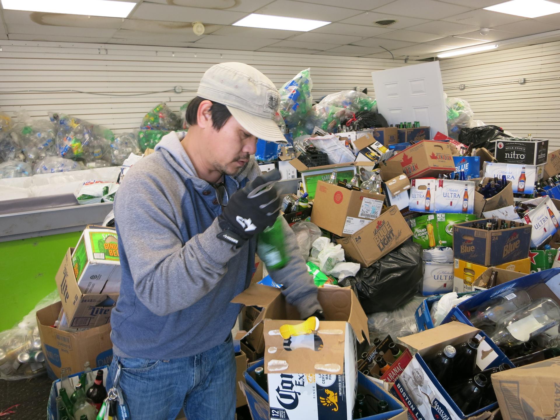 Buffalo resident and Burmese immigrant Zah Win earns his living collecting cans and bottles for recycling.