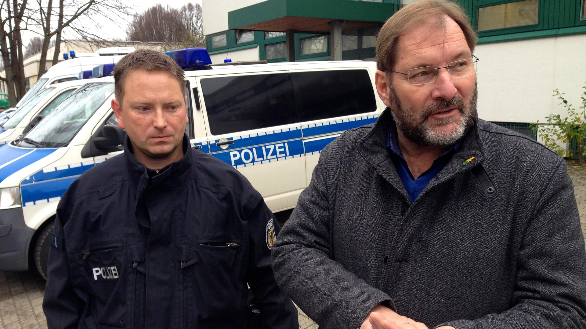 Mark Matthies (left) is with the German national police and Jörg Radek is with the national police union.