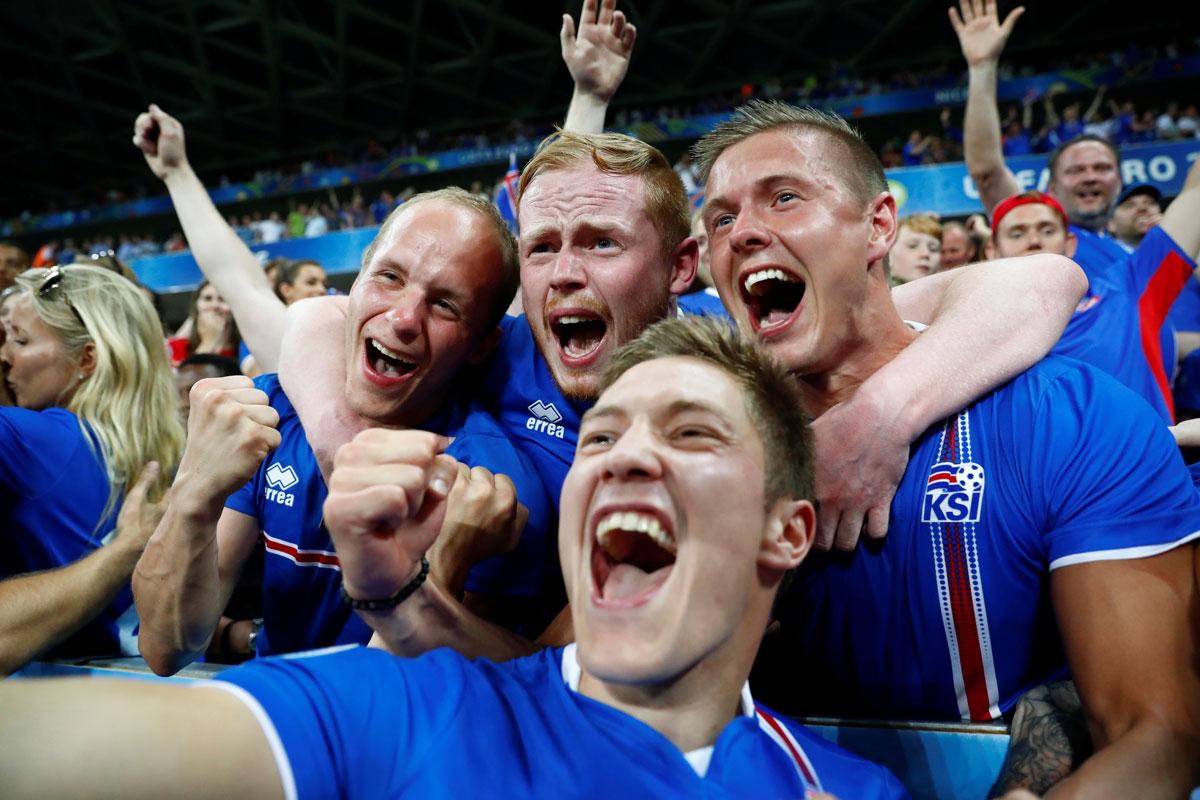 Iceland fans celebrate after the game.