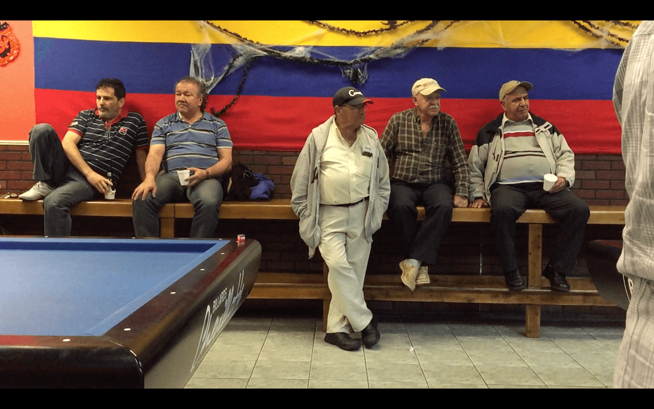 Inside Billares Colombia, a pool hall in East Boston where many of the patrons are Donmatians.