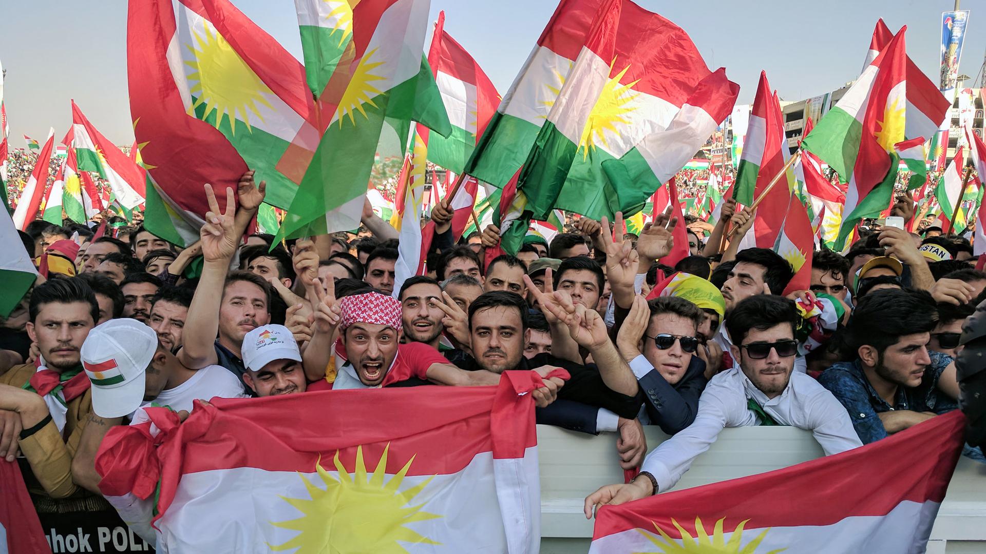 Tens of thousands turn out for a rally in Erbil, northern Iraq, in support of Kurdistan's independence referendum.