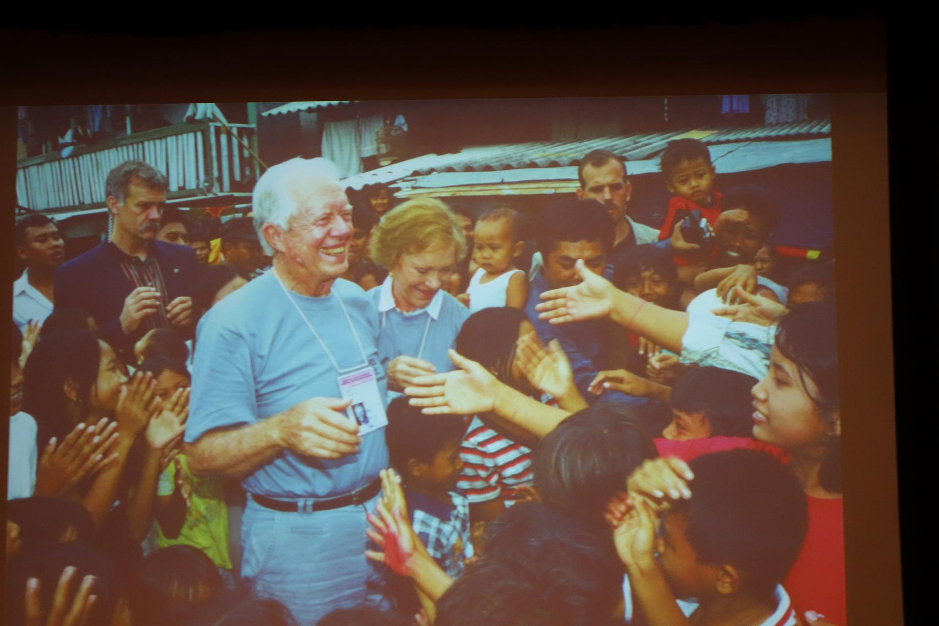 Former US President Jimmy Carter and Rosalynn Carter observing a village election