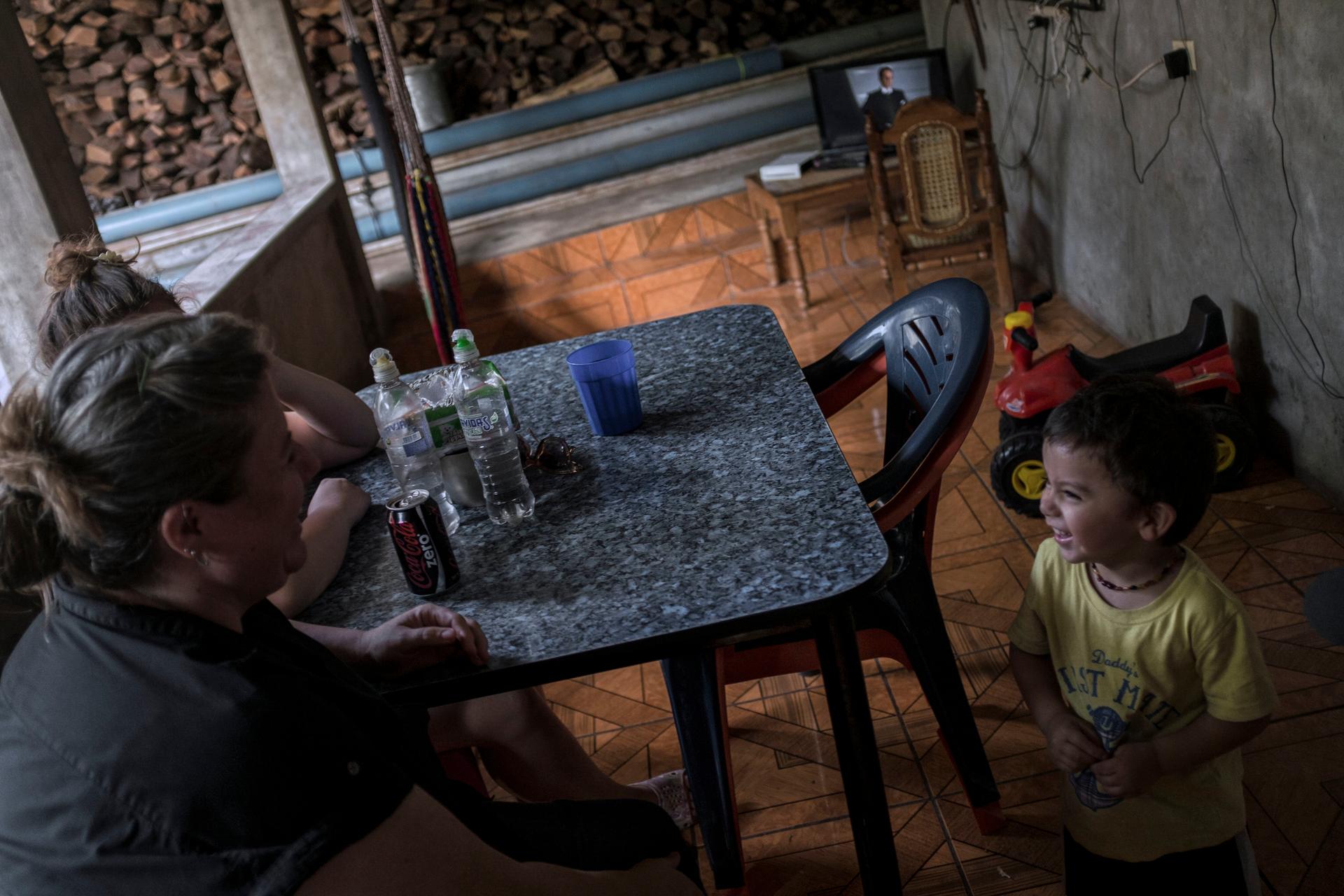 Andrea Hernandez plays with her 2yrs old son Elijah at their home in Sensuntepeque