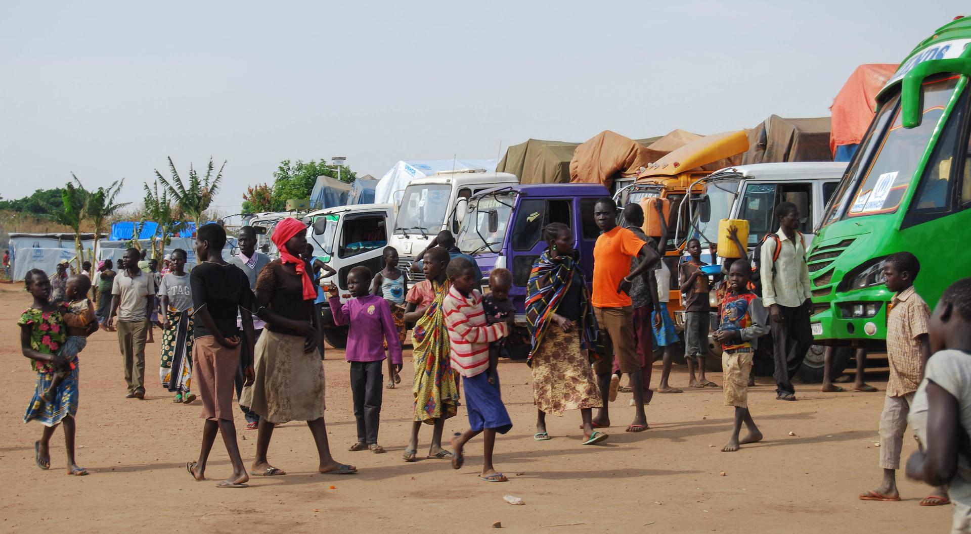Refugees from South Sudan at a reception center in Kuluba, in northwest Uganda, wait to be registered and delivered to a settlement where they may live for years.