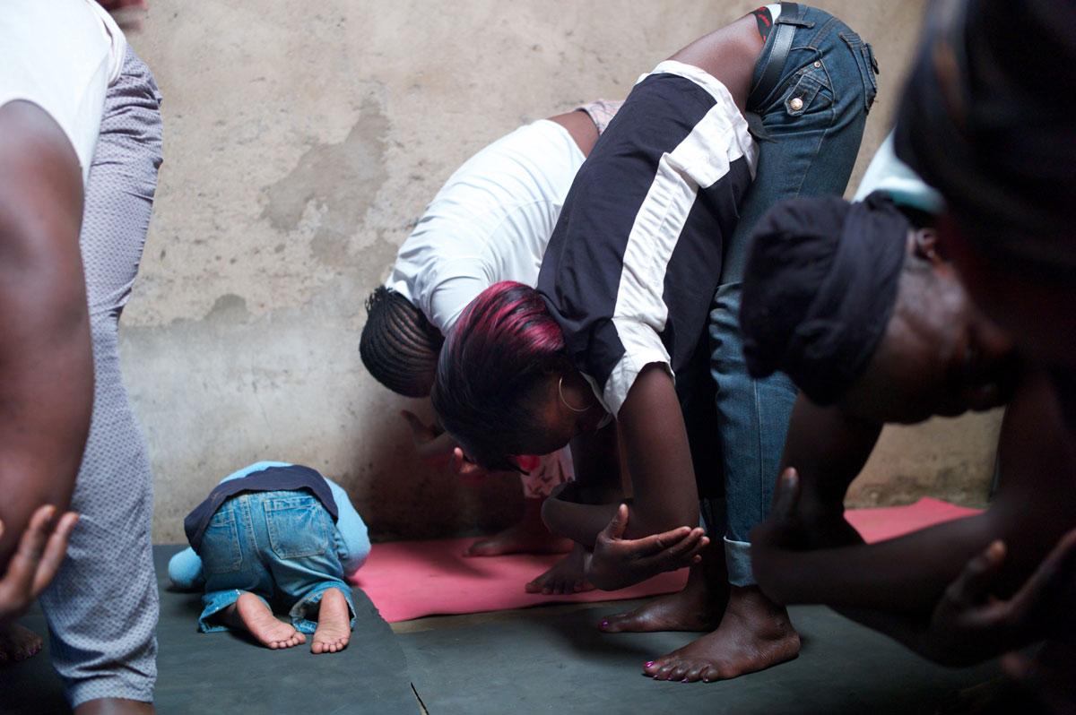 Students get the hang of the rag-doll pose in a class for girls and young mothers in Kariobangi.