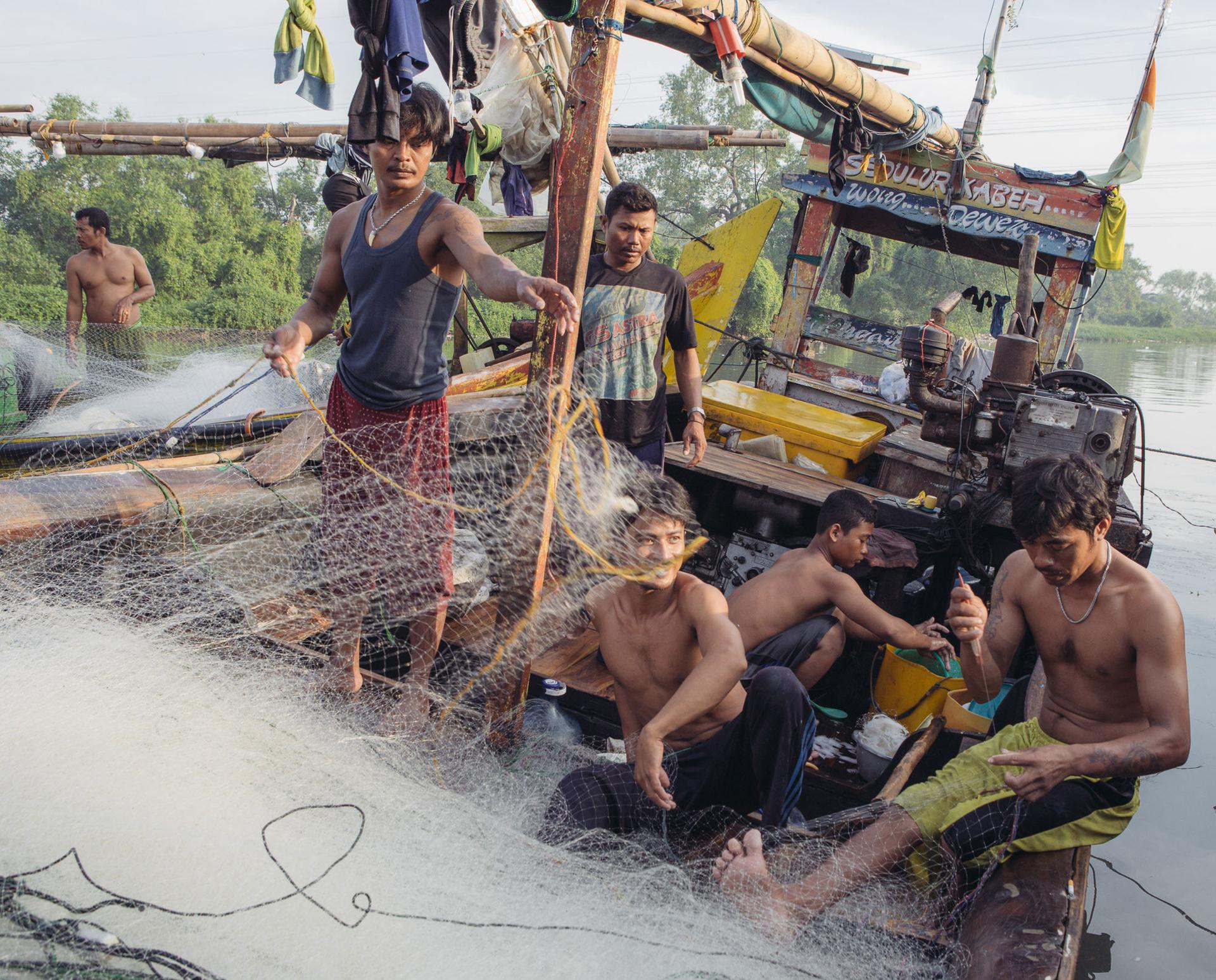 Fishermen in Muara Angke, Jakarta, a neighborhood along Jakarta Bay whose economy is largely dependent on the bay.