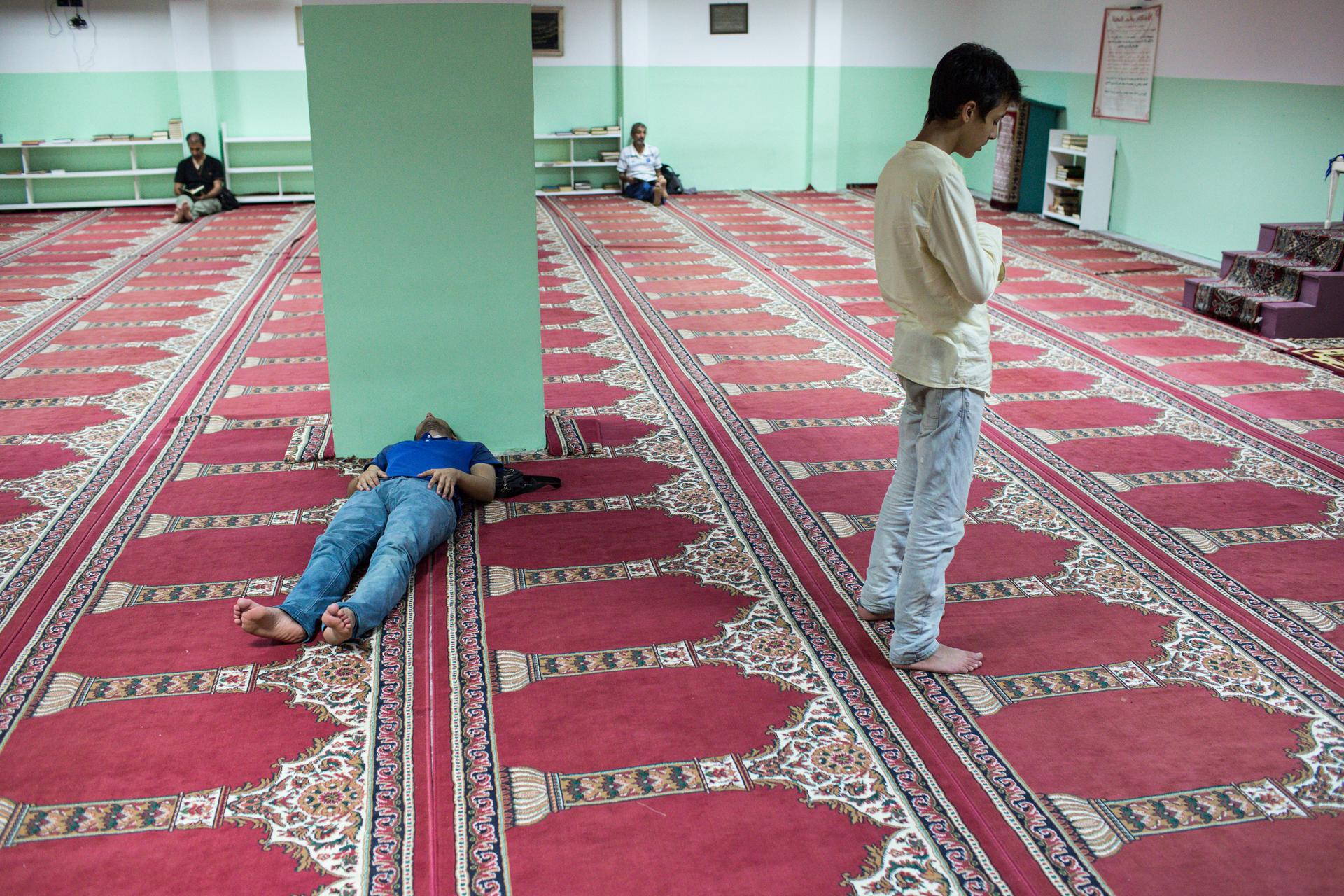 Syrian Asylum seeker Nawras Soukhta prays at a mosque in Naples, Italy.