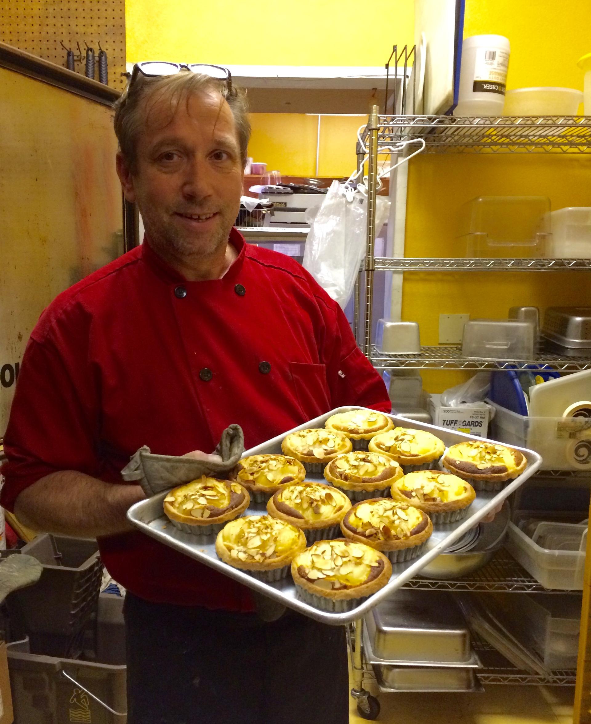 Chef Thierry Marceaux with a fresh batch of pastries at Le Rendez-vous Café in Las Cruces, New Mexico