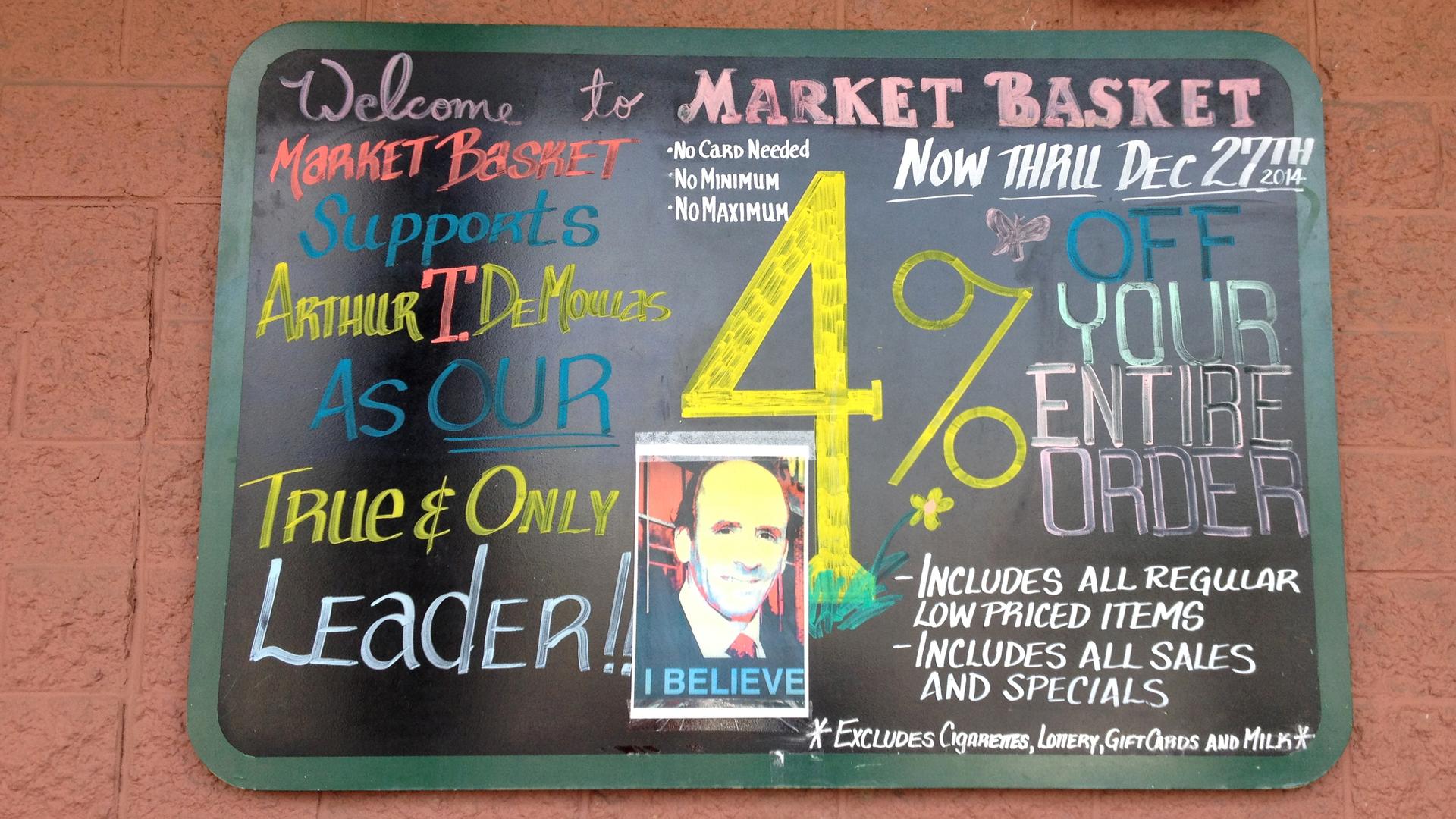 During the worker-led protest, posters of Market Basket's CEO, Arthur T. Demoulas, were plastered to the walls of this grocery store in Somerville, Mass. Arthur T, as he was affectionately called, recently regained control of the company after the board f